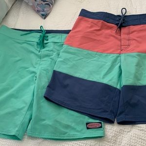 Two pairs of Vineyard Vines board shorts.